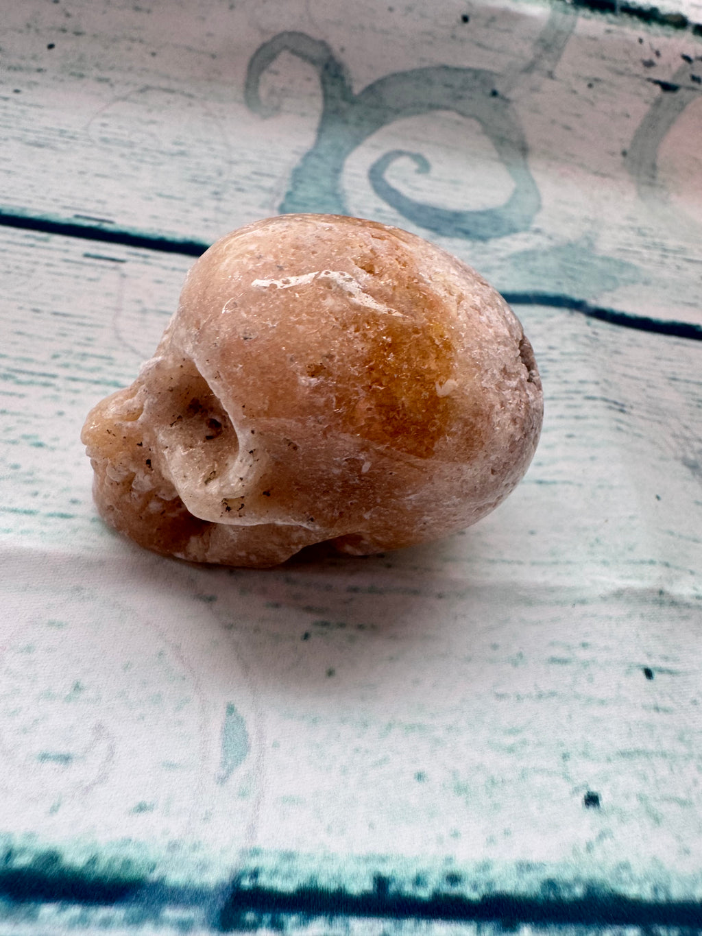 Carved calcite crystal skull