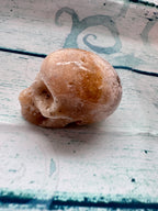Carved calcite crystal skull