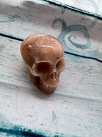 Carved calcite crystal skull