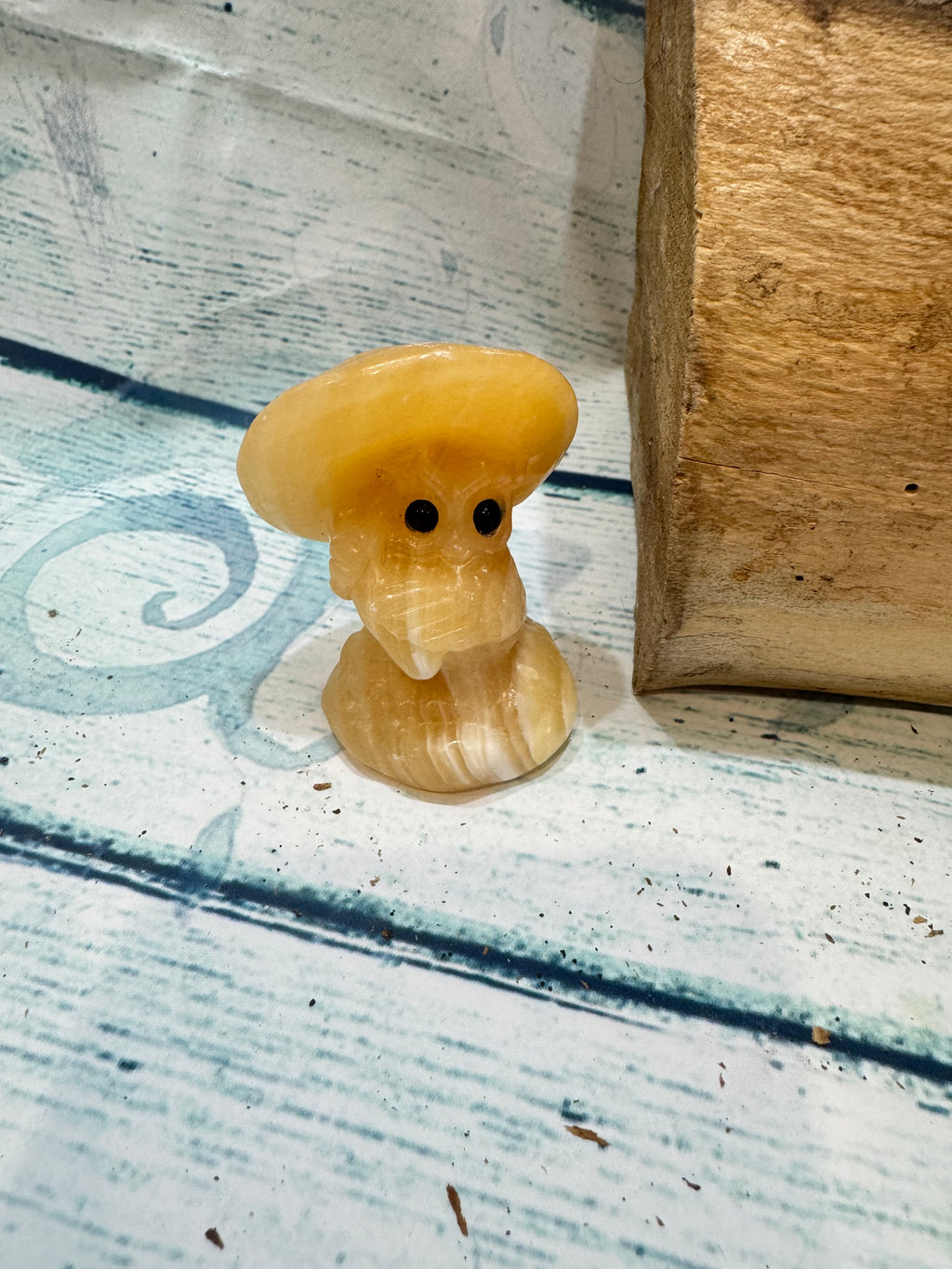 Yellow Calcite Carved Owl Under a Toadstool