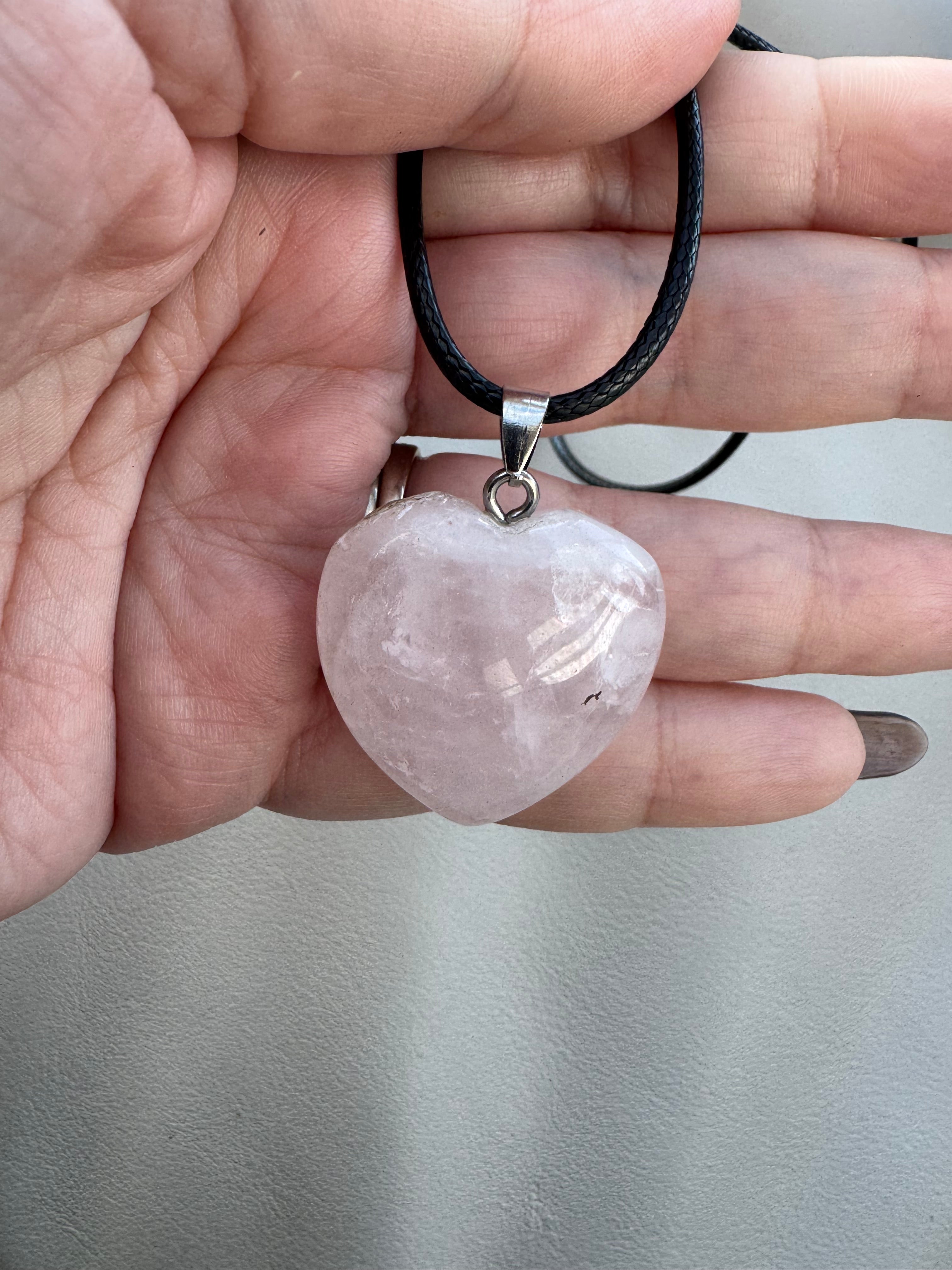 Rose quartz heart pendant.