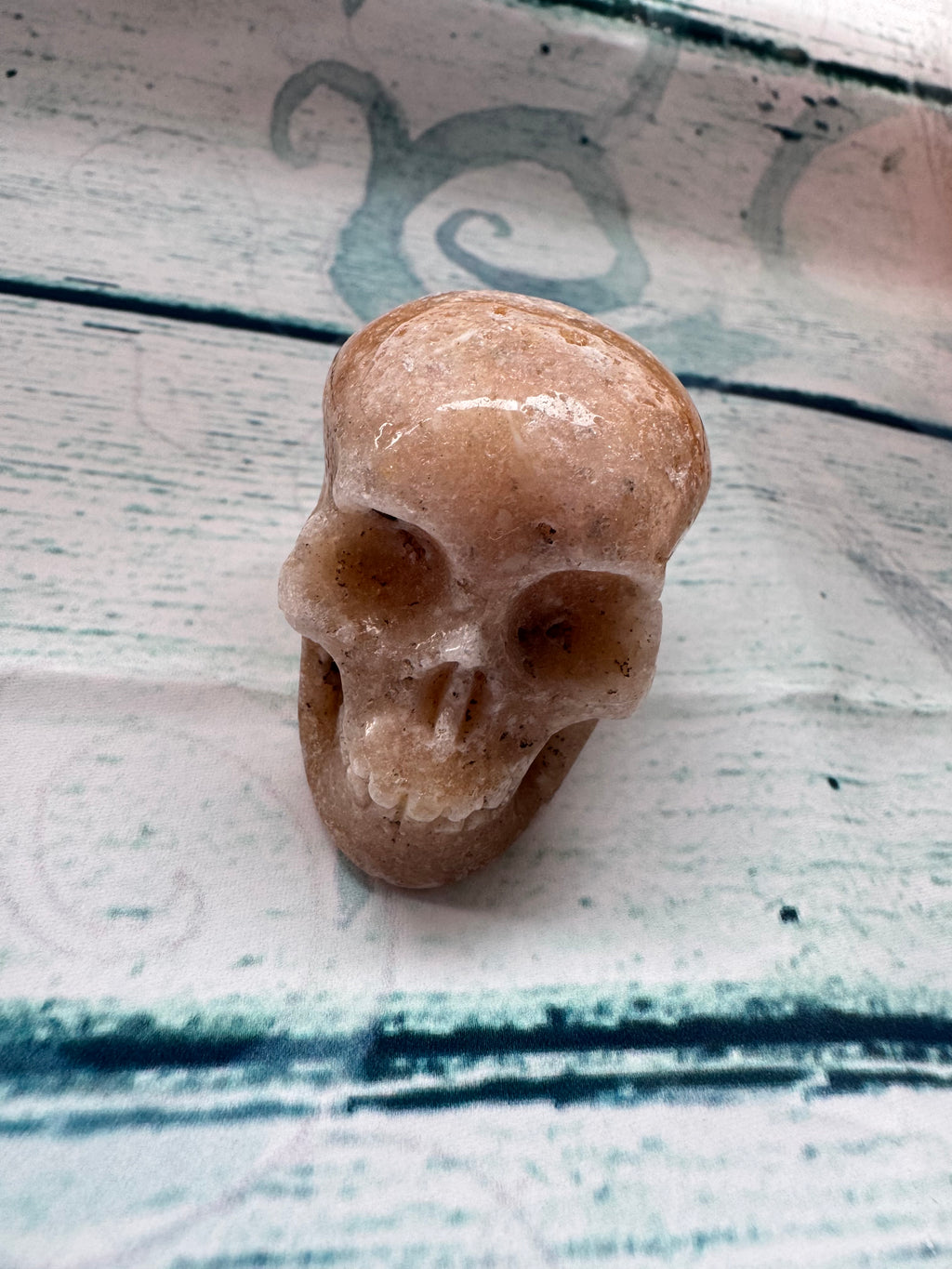 Carved calcite crystal skull