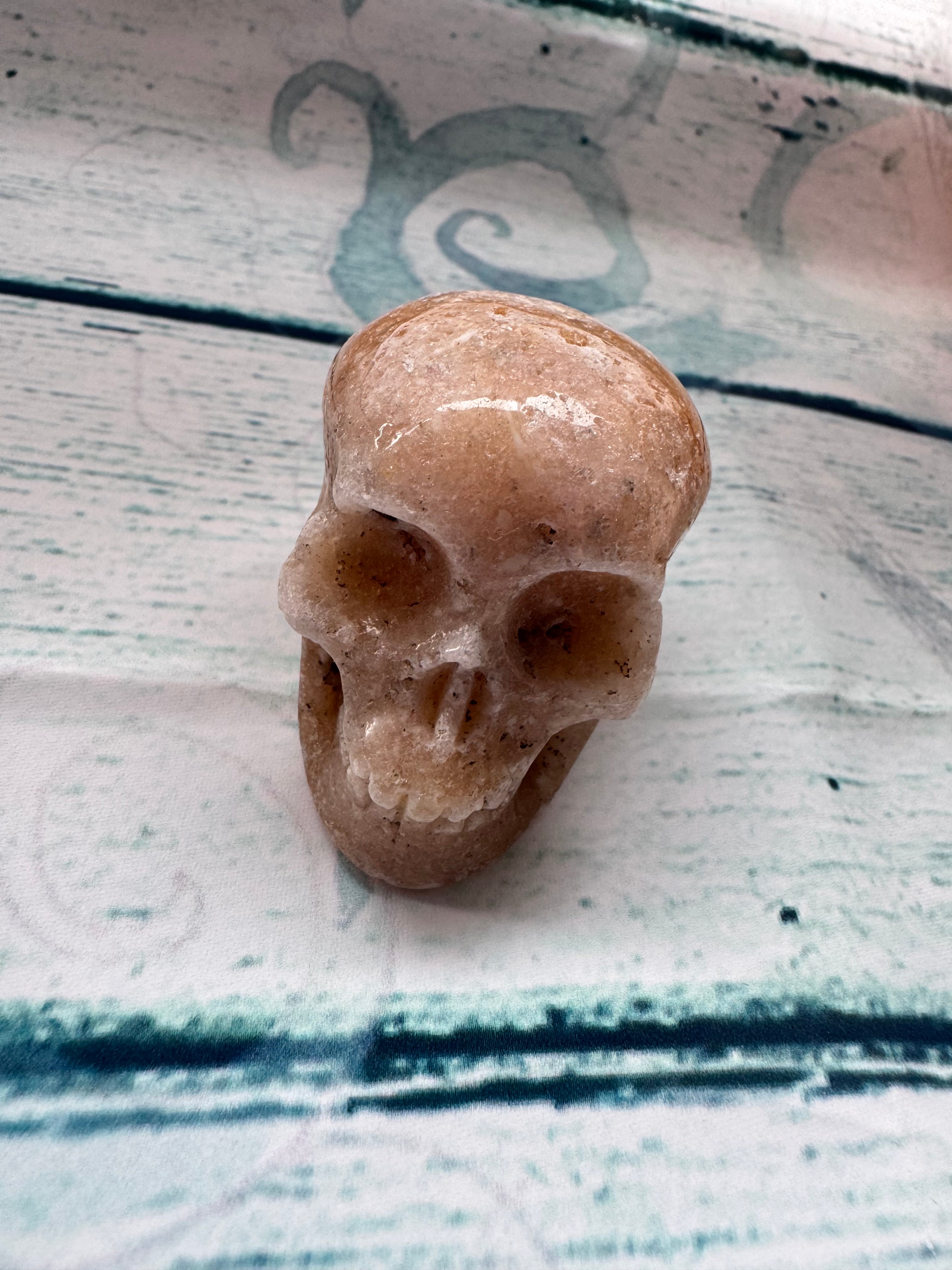 Carved calcite crystal skull