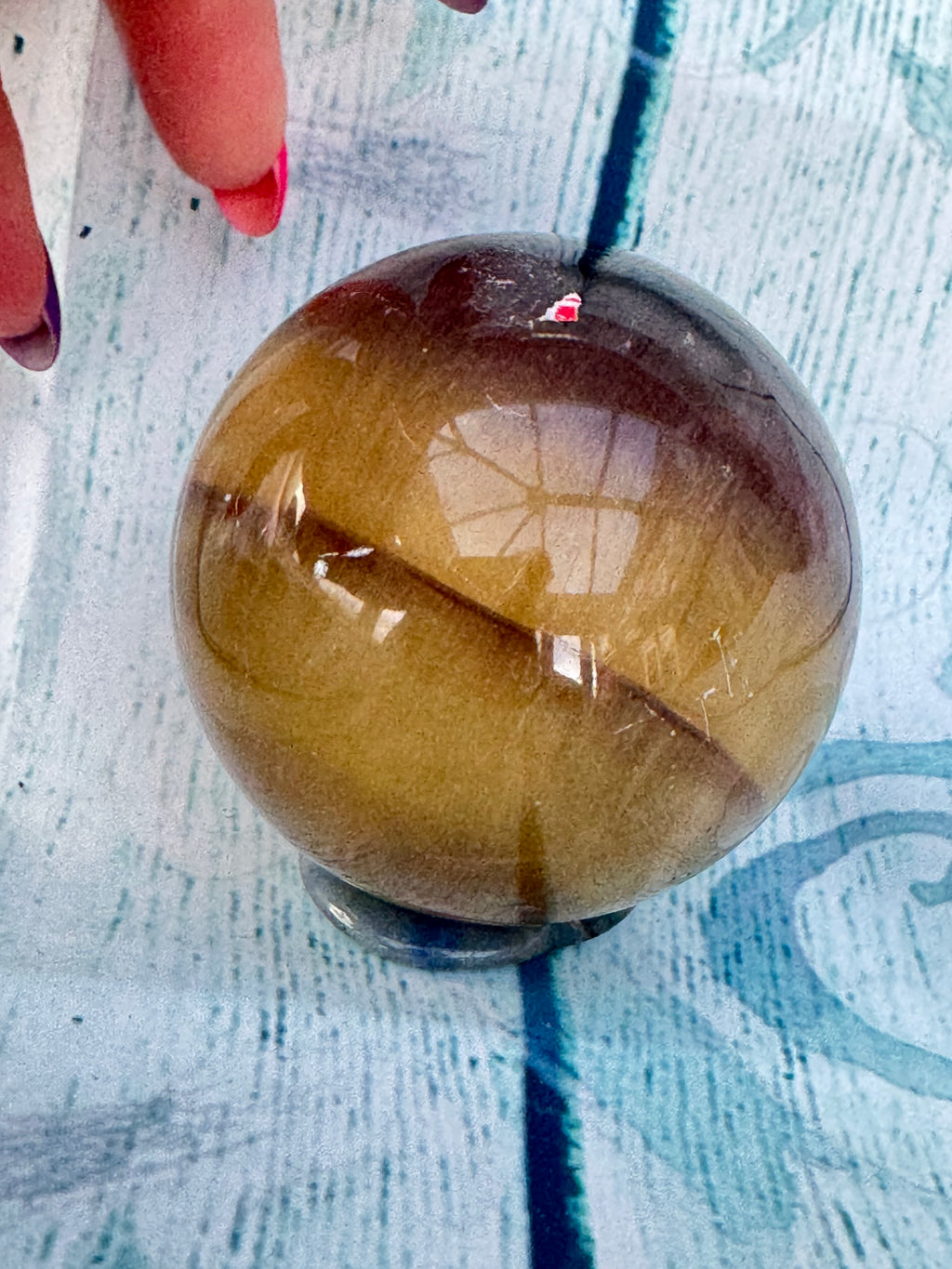 Polished banded fluorite sphere