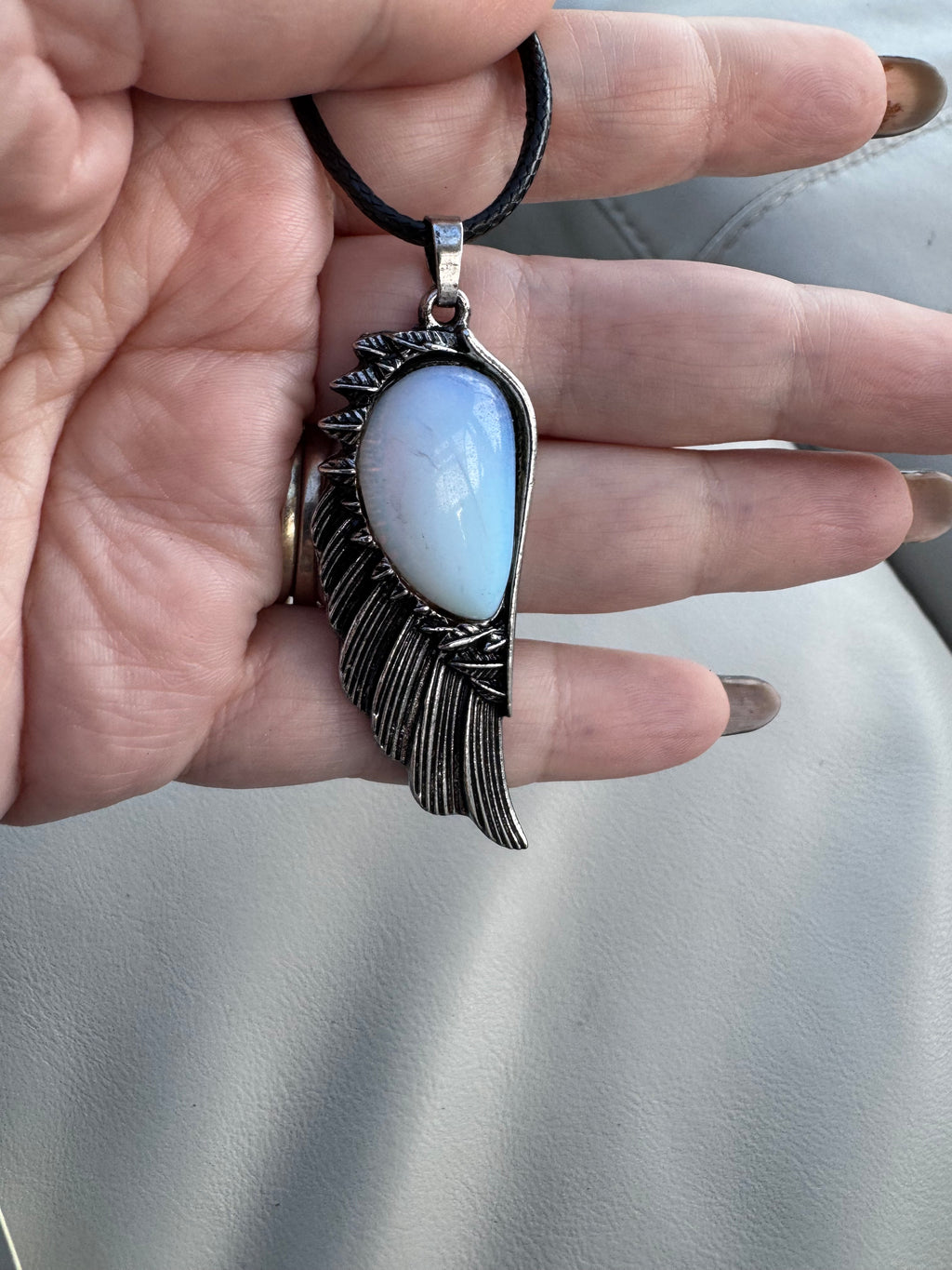 Feather and opalite pendant