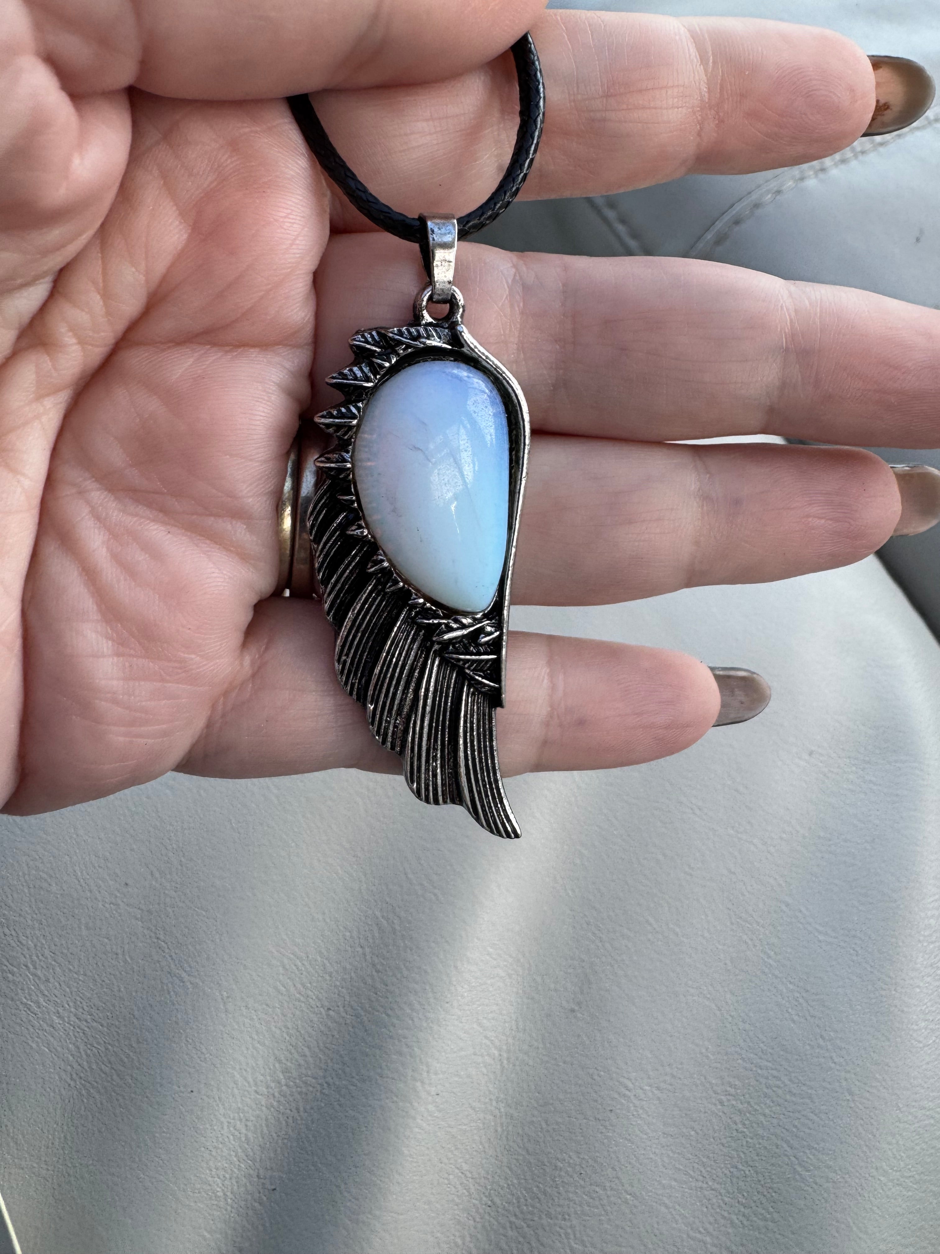 Feather and opalite pendant
