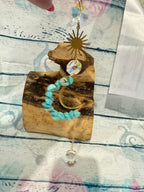 Turquoise sun and moon - sun catcher