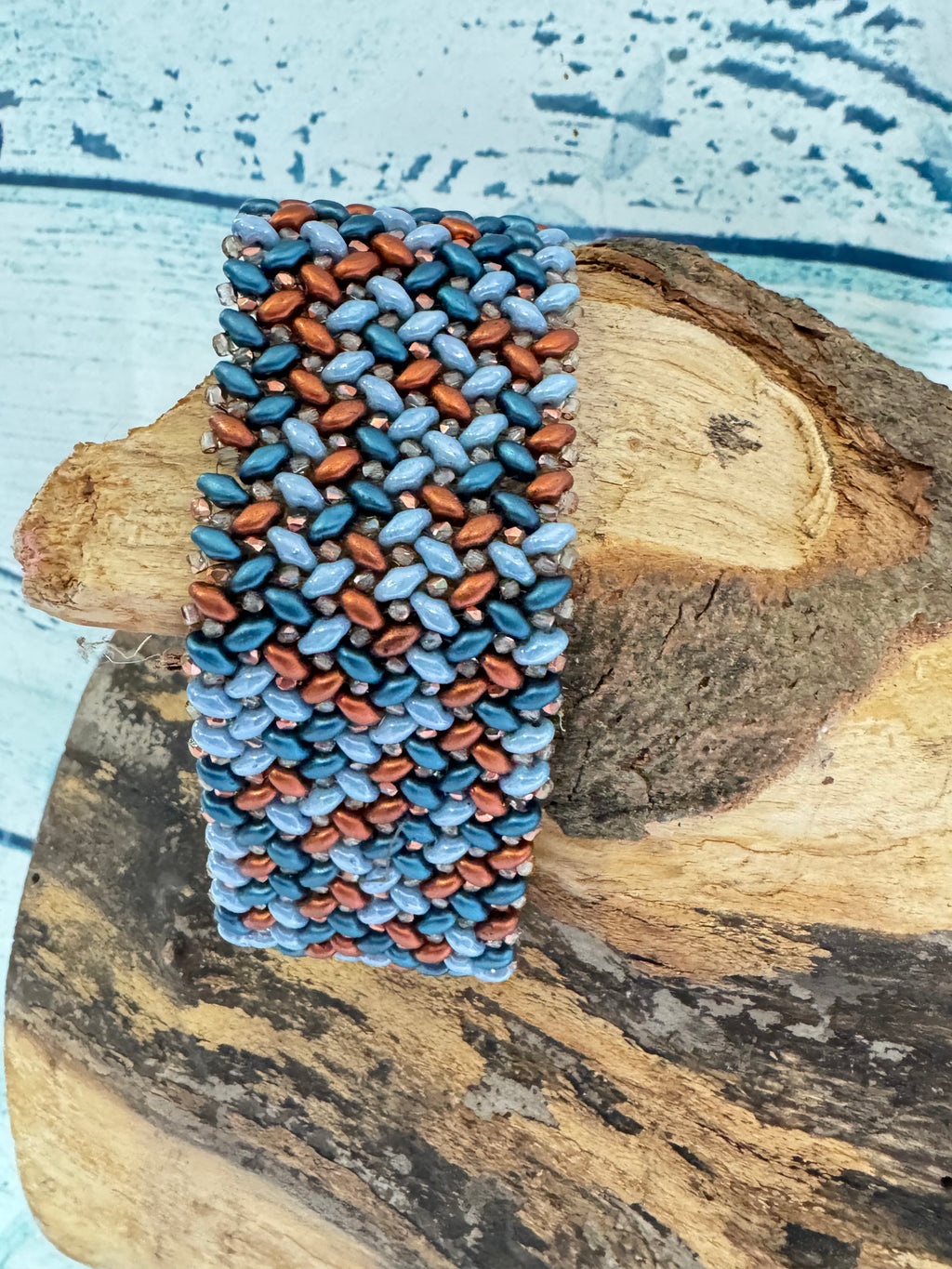 Blue and bronze beaded cuff bracelet