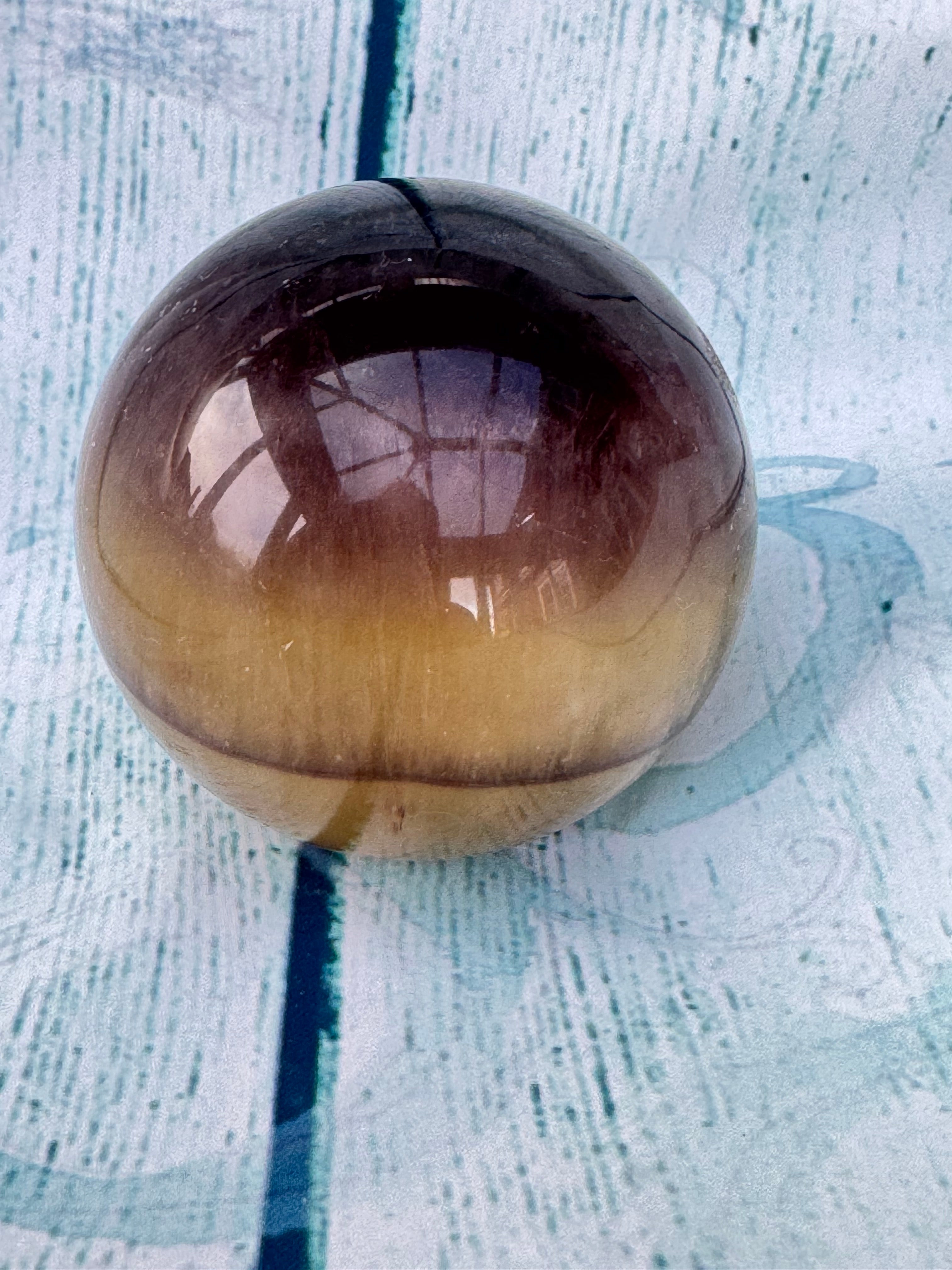 Polished banded fluorite sphere