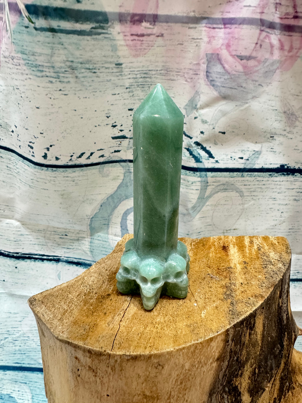 Aventurine carved tower with skull base