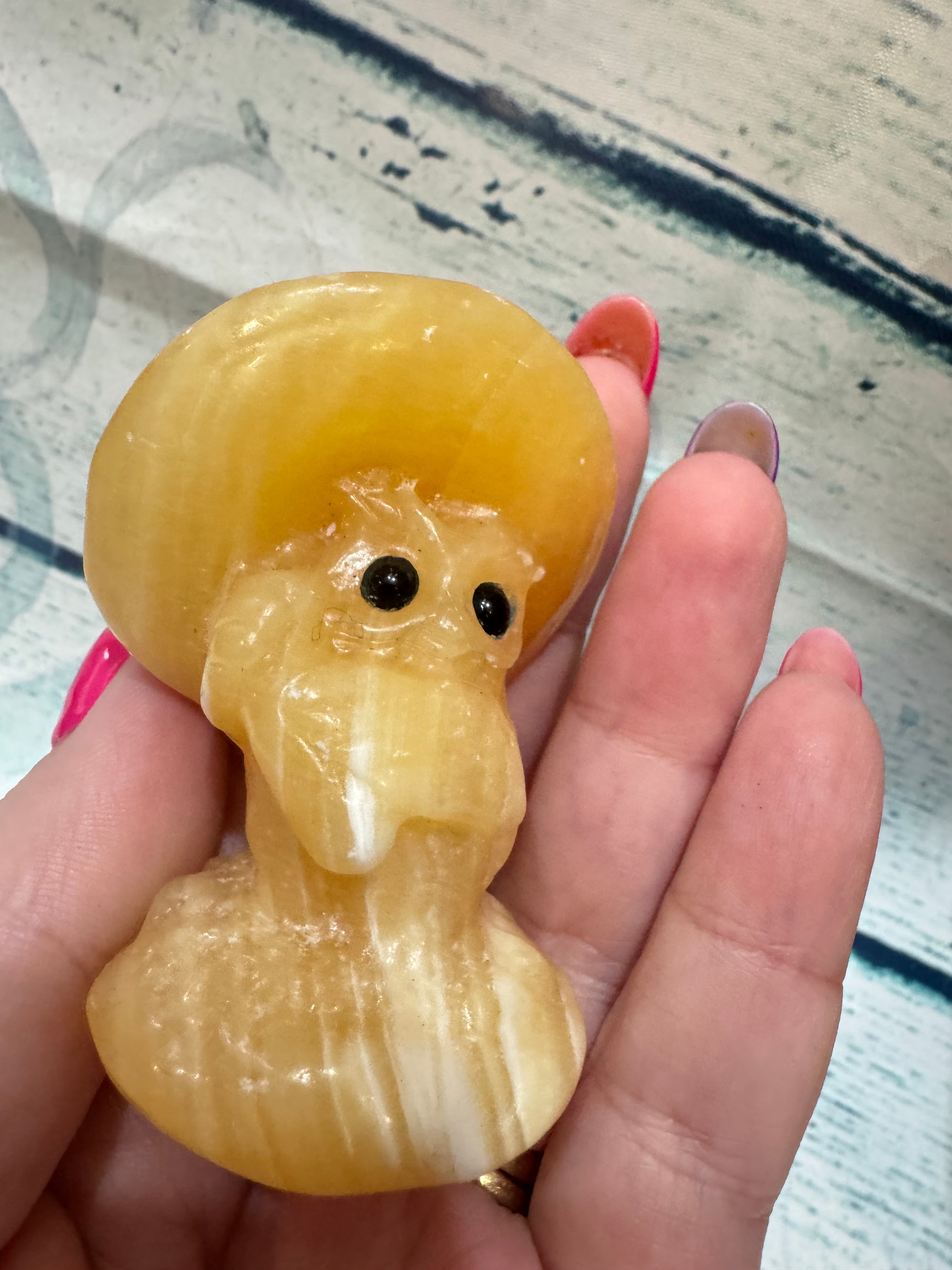 Yellow Calcite Carved Owl Under a Toadstool