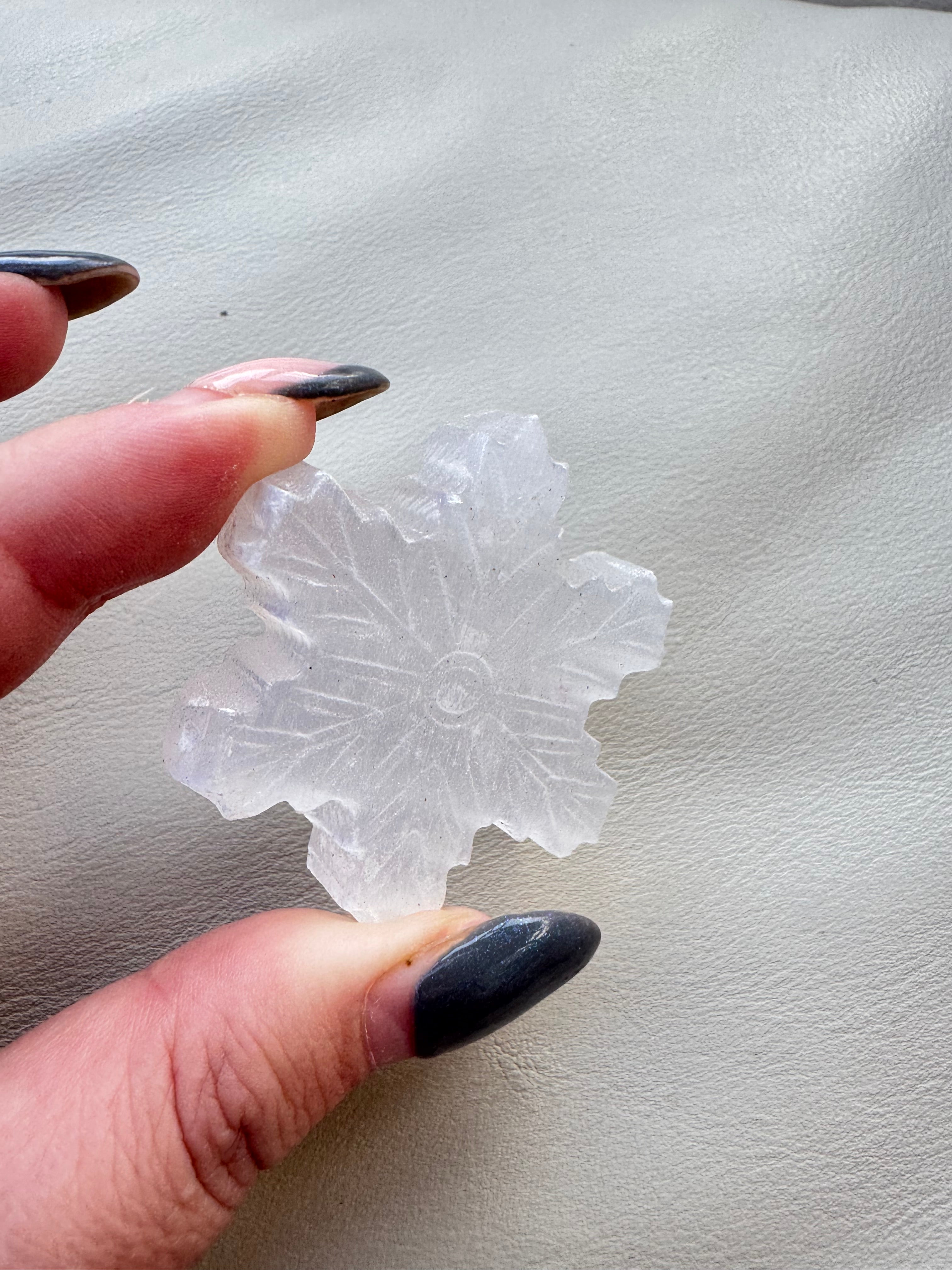 Carved selenite snowflake