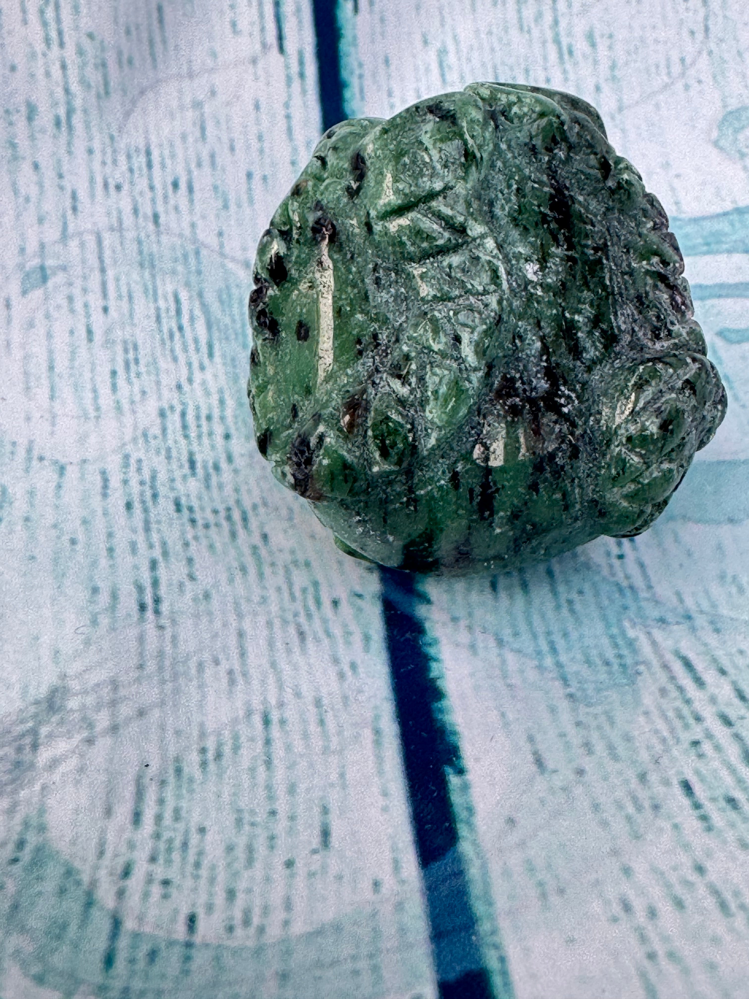 Ruby in zoisite carved crystal skull
