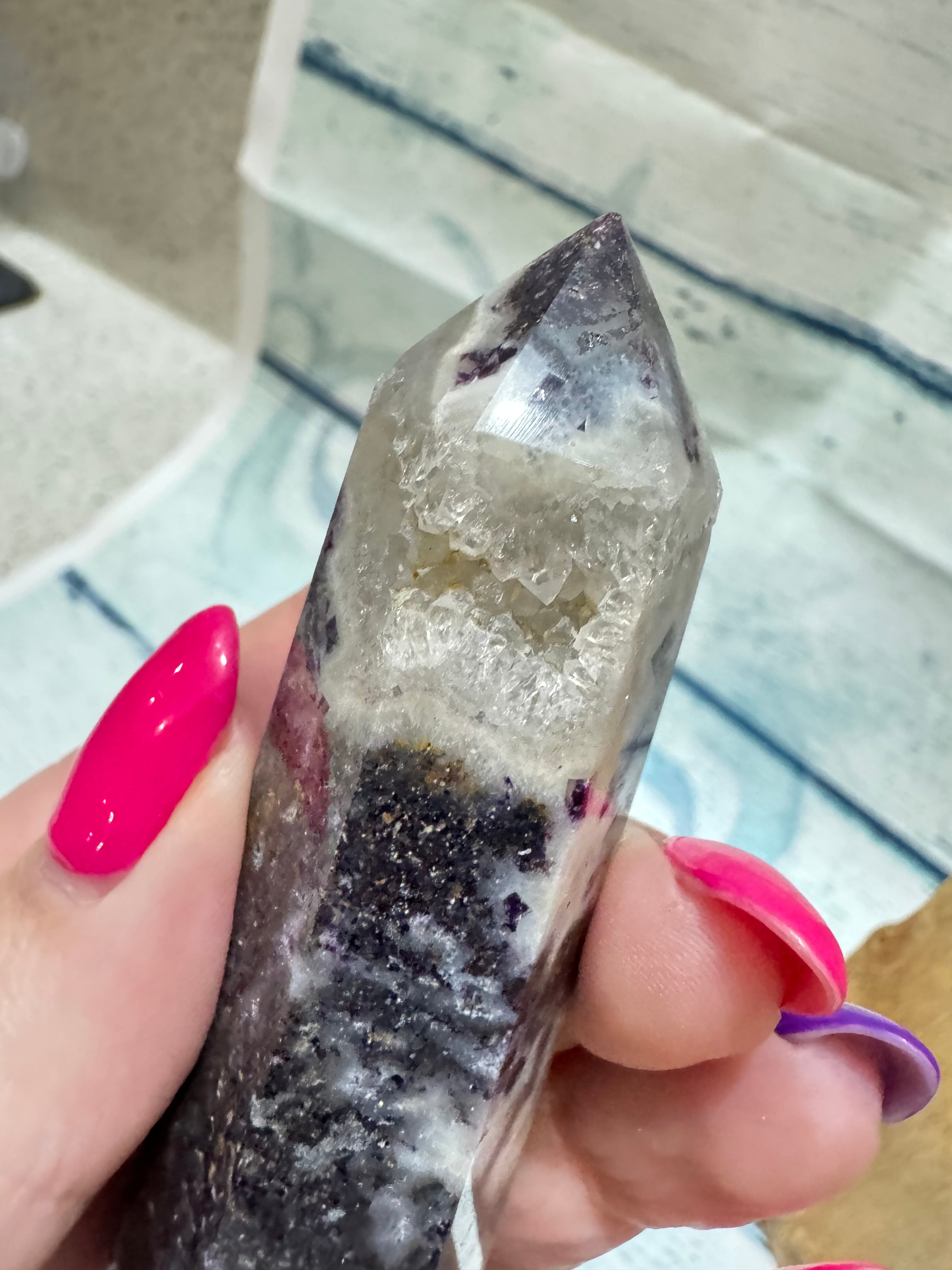 Quartz tower with natural inclusions