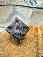 Carved Larvakite Die