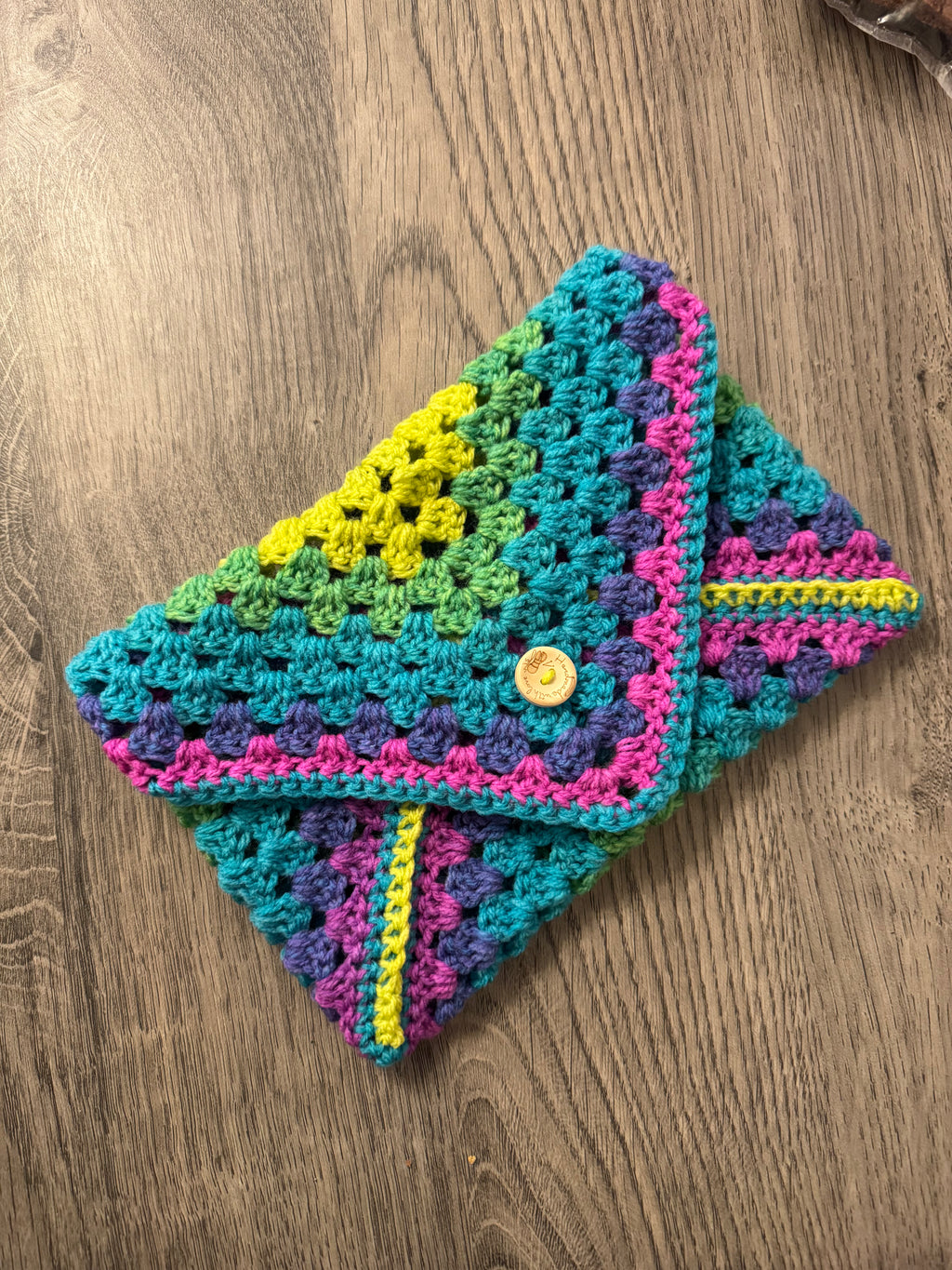 Colourful crocheted book sleeve