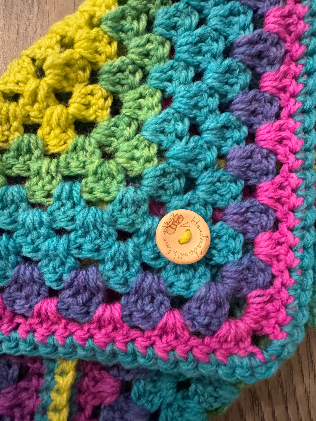 Colourful crocheted book sleeve