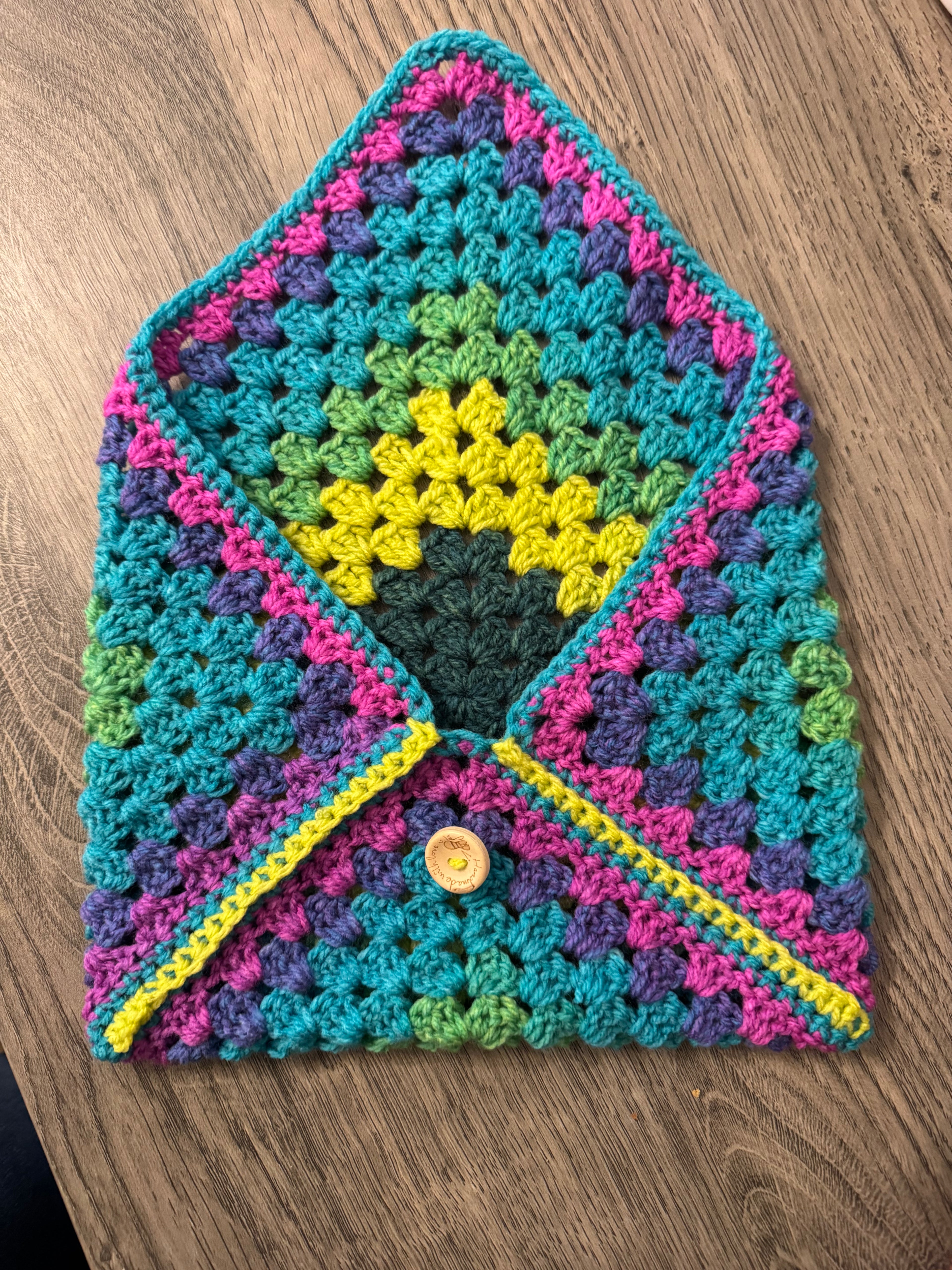 Colourful crocheted book sleeve