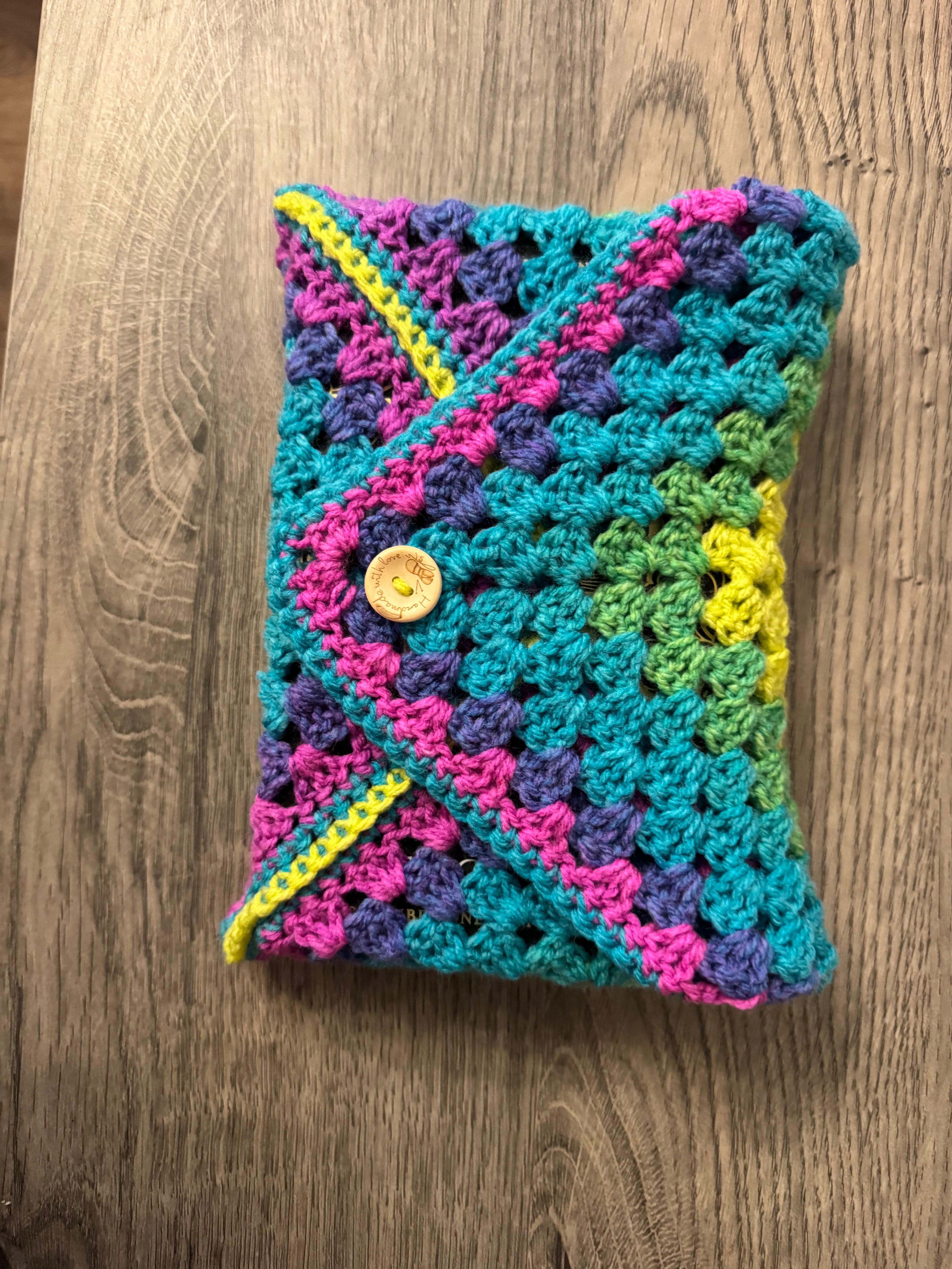 Colourful crocheted book sleeve