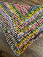 Crocheted arrow shawl